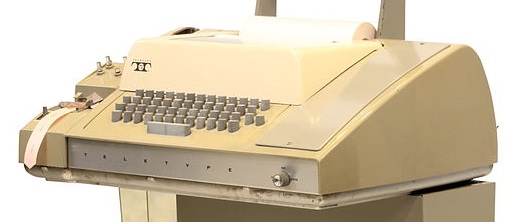 Model 33 teletype with paper tape reader/writer